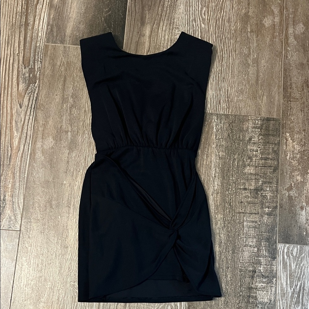 Free people black dress with tapered waist/ back and skirt details size XS